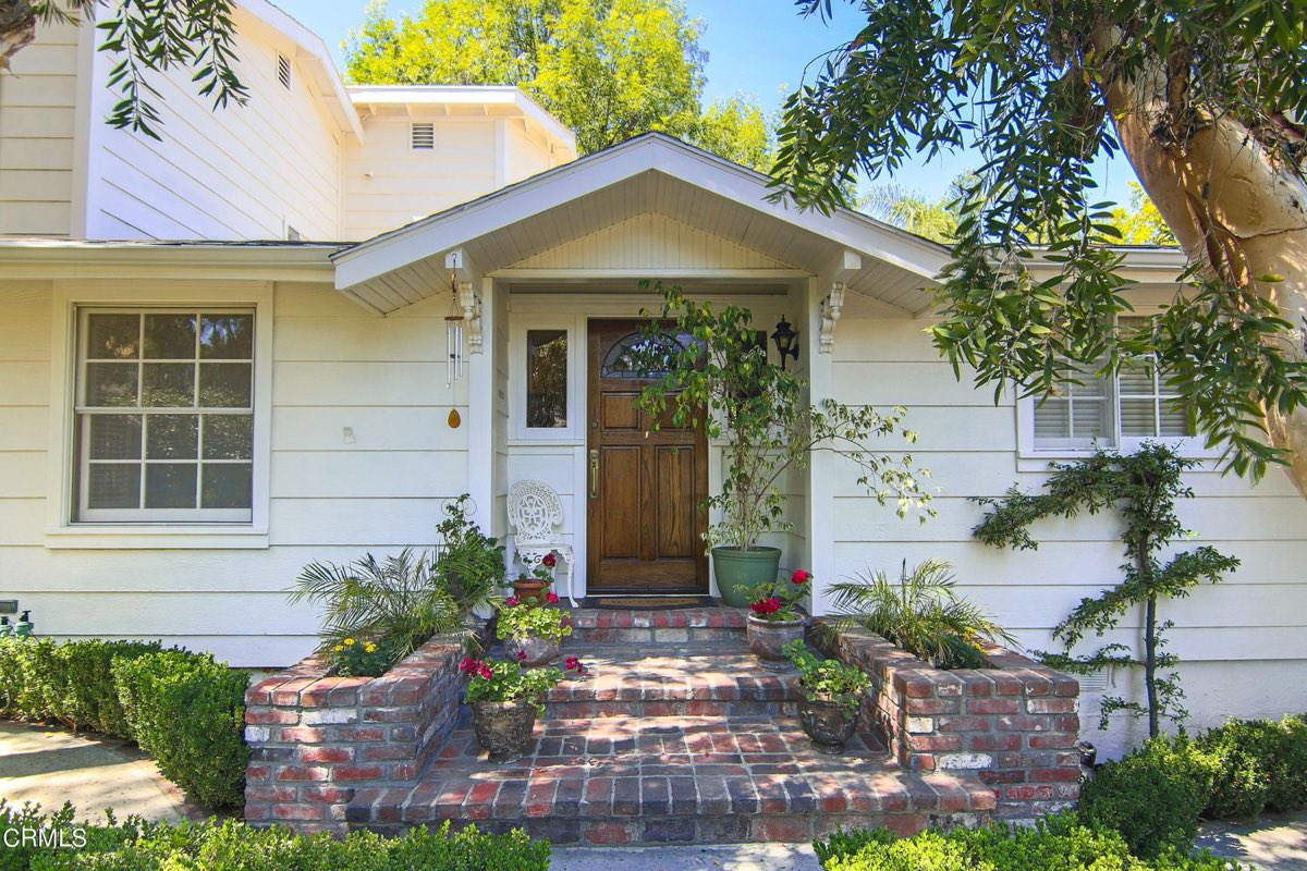 Front door and brick steps of a Woodland Hills home